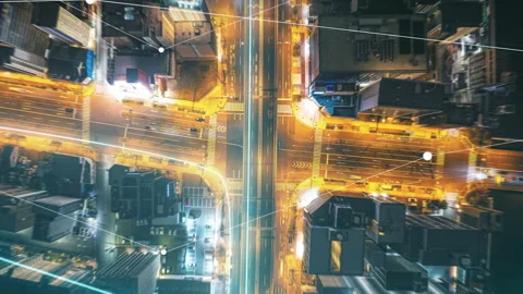 Street intersection at night with modern data visualization overlays displaying Stock Footage 276107621