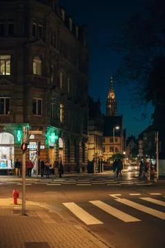 Street intersection in Strasbourg at dusk Stock Photos