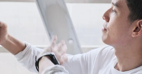 Street kid face time using mobile phone with his girlfriend in overpass, weaving Stock Footage 106382588