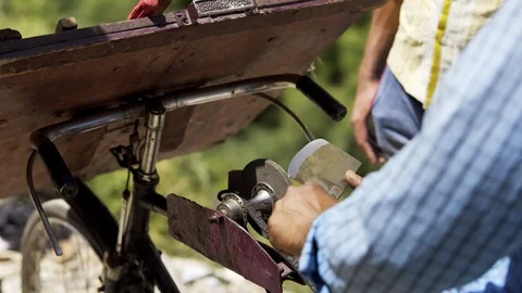 Street knife sharpener in India Stock Footage 97798404