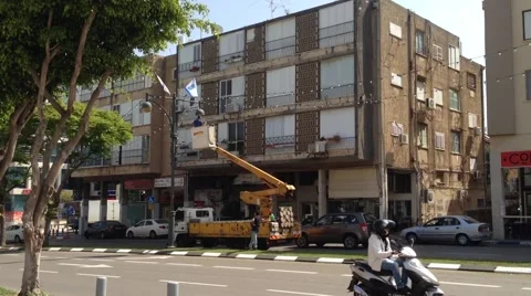 Street Lamp Fixing few days before Independence Day, Herzliya Israel 2015 Stock Footage 49249342