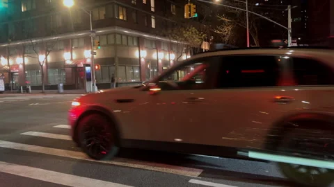 Street level night timelapse on 30th Street in Manhattan with traffic and c.. Stock Footage 324921778
