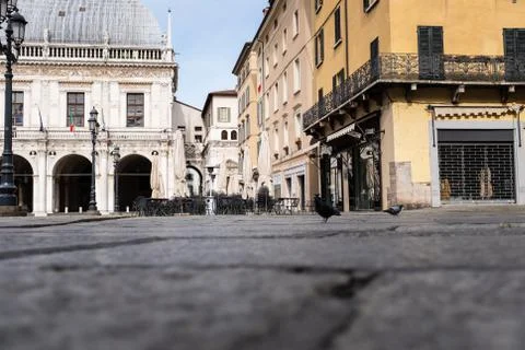 A street level view of the completely empty Loggia Square in Brescia (Italy) Stock Photos