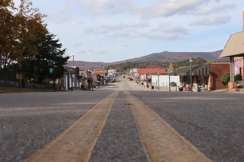 Street-level view down a small town main street Stock Photos