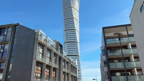 Street level view of Turning Torso twisted skyscraper in Malmo city, Sweden Stock Footage 340960339
