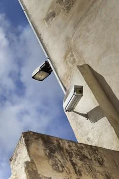 Street light and camera Stock Photos