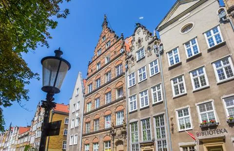 Street light and historic facades in Swietego Ducha street in Gdansk Stock Photos