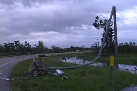 Street light is bent like spaghetti from Hurricane Charley Stock Footage 12575106