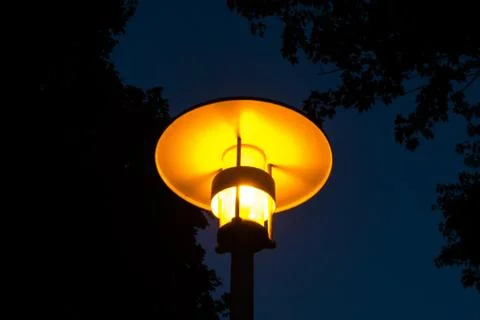 Street light night view orange light with tree Stock Photos