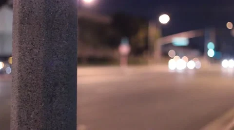 Street light pole in front of street at night Stock Footage 47466489