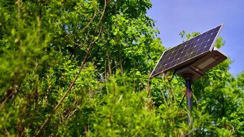 Street light powered by solar panel Stock Photos