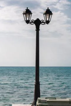 Street light on a seafront 스톡 사진