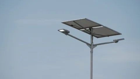 Street light working from solar panel Stock Footage 122349049