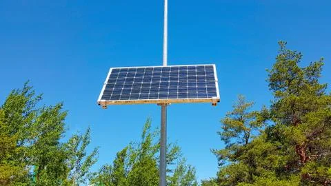 Street lighting using solar panel under the blue sky Stock Photos