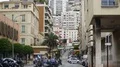 Street in Monaco, busy people walking, transport passing by, European city life 4k or 4k+ Resolution