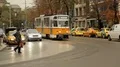 Street with moving traffic and pedestrians in Sofia, Bulgaria, weekday city life HD Footage