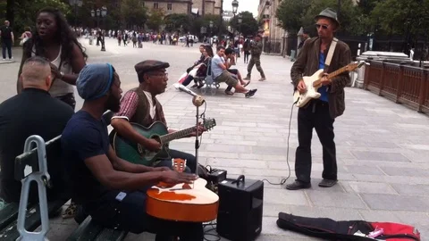 Street Musicians At Notre Dame In Paris Stock Footage