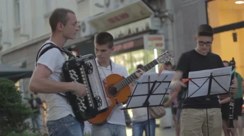 Street musicians play instruments Stock Footage 65014725