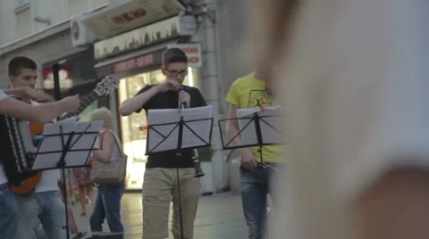 Street musicians play instruments Stock Footage 65014735