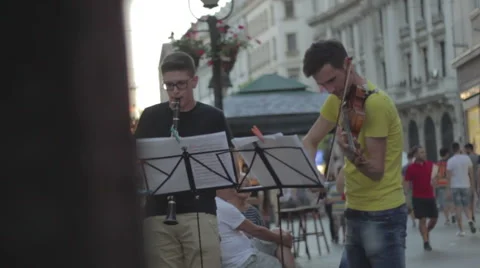 Street musicians play instruments Stock Footage 65018812