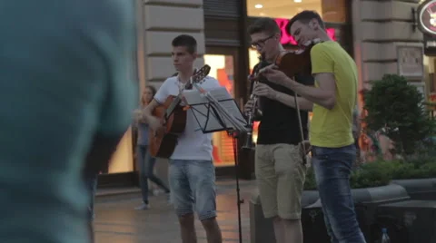 Street musicians play instruments Stock Footage 65018989