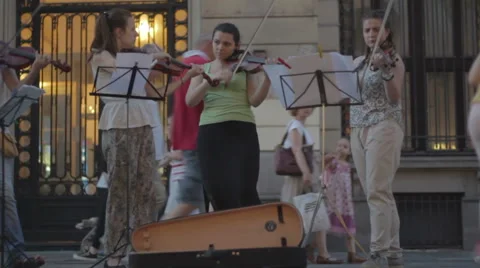 Street musicians play instruments Stock Footage 65019193