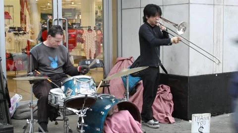 Street Musicians Playing at Toronto's Eaton Centre Sidewalk Stock Footage