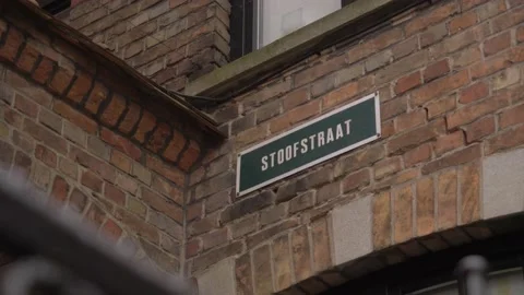 Street name plaque on a authentic old brick wall. Stock Footage 232340997