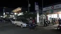 Street night scenery motor bikes people shops in Labuan Bajo, Flores Indonesia 4k or 4k+ Resolution