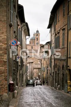 Street of old urbino, italy at dull day Stock Photos