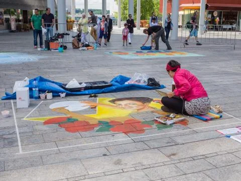 Street painter at work Stockfoto's