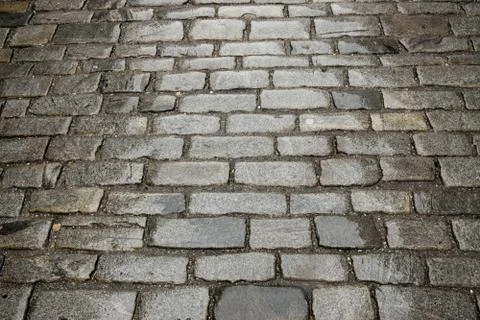 Street paved with cobblestone Stock Photos