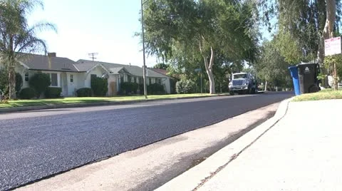 Street pavement crew surfacing2 Stock Footage