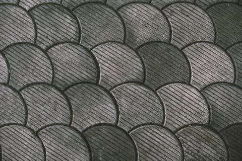 Street paving, fish scale pattern Stock Photos
