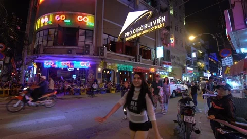 Street Performer Blows Fire  - Bui Vien Street - Ho Chi Minh City - Vietnam Stock Footage 87134176