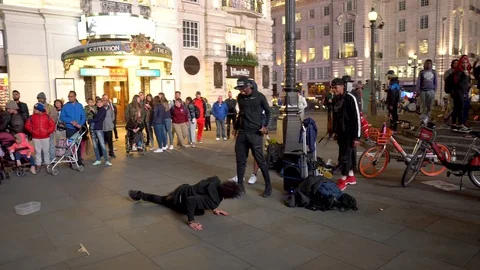 Street Performer Breakdancing With Crowd Watching in London, UK Stock Footage 111368609