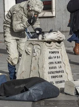 Street performer characterizing himself to do mime Stock Photos