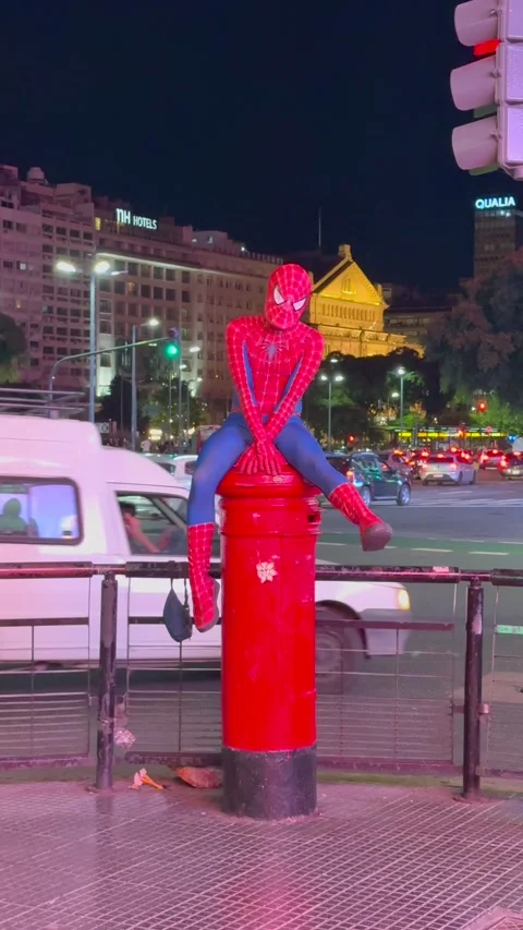 Street Performer Dressed as Spider-Man Poses on Fire Hydrant in Buenos Aires Stock Footage 339212677
