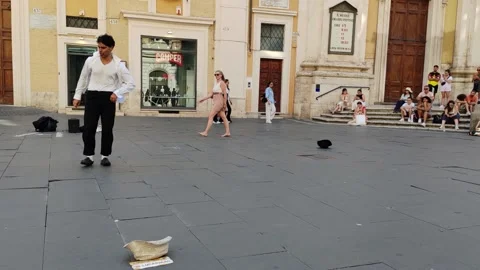 A street performer imitates Michael Jackson&amp;#039;s talents Stock Footage 320999880