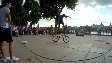 Street performers doing amazing tricks with their bikes in London, UK Stock Footage 79929140