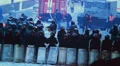 Street riot Special Forces shields helmets against crowd winter HD Footage