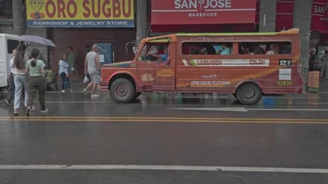 Street scene with a Jeepney Multicab, dr... | Stock Video | Pond5