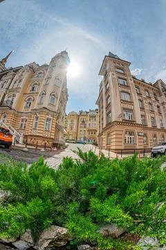 Street scene in Kyiv, Ukraine reflected in a curved mirror Tall buildings, .. Stock Photos