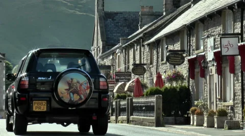 Street scene, passing car, Castleton, Peak District. Video stock 53407533