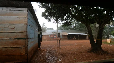 Street scene in the rain near Jinja, Uganda. Stock Footage 59796798