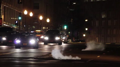 Street scene in Washington DC at night. Traffic and Pedestrians. Stock Footage