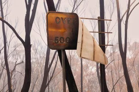 A street sign burnt by bushfire in The Blue Mountains in Australia Stock Photos