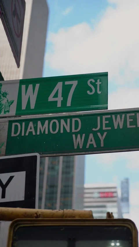 The street sign located at the intersection of W 47th St and Diamond Jewel Way 스톡 동영상 314575961