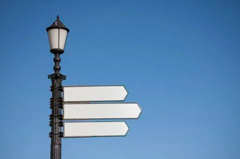 Street signposts template with a light on the sky. Stock Illustration