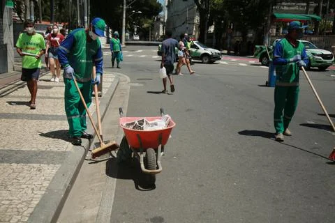 Street sweeper are seen while cleaning a street Stock Photos